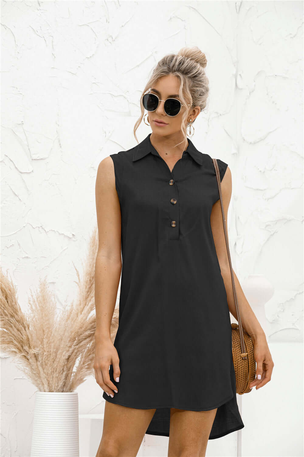 Stylish black lapel button slit vest shirt dress worn by a model, perfect for summer fashion.