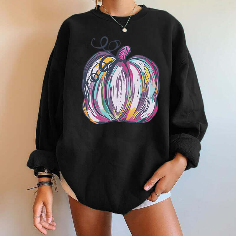 Halloween Pumpkin Letter Print Drop Shoulder Section Fleece Sweatshirt in black with colorful pumpkin design.
