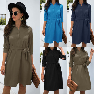 Solid color button lapel mid-sleeve shirt dress in various hues, featuring A-line skirt and waist tie detail.