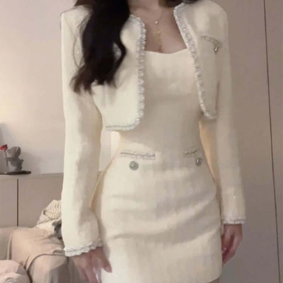 Elegant beige diamond inlaid high-end two-piece set featuring a round neck top and fitted dress.