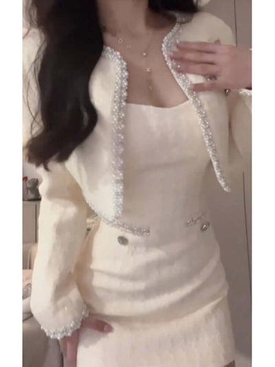 Heavy industry diamond inlaid high-end top with round neck and loose fit, featured in beige color.