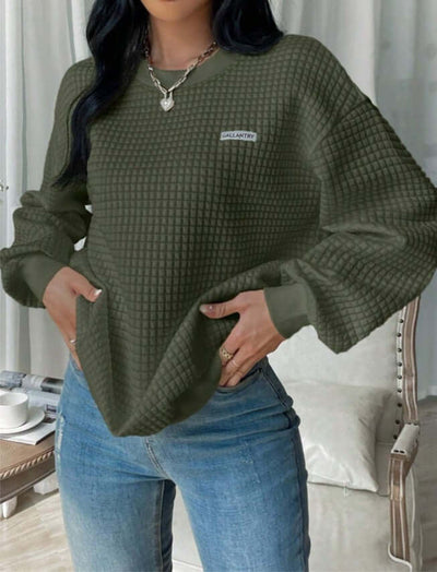 Drop shoulder sweater in army green with textured pattern, featuring a stylish patch detail, perfect for casual wear.